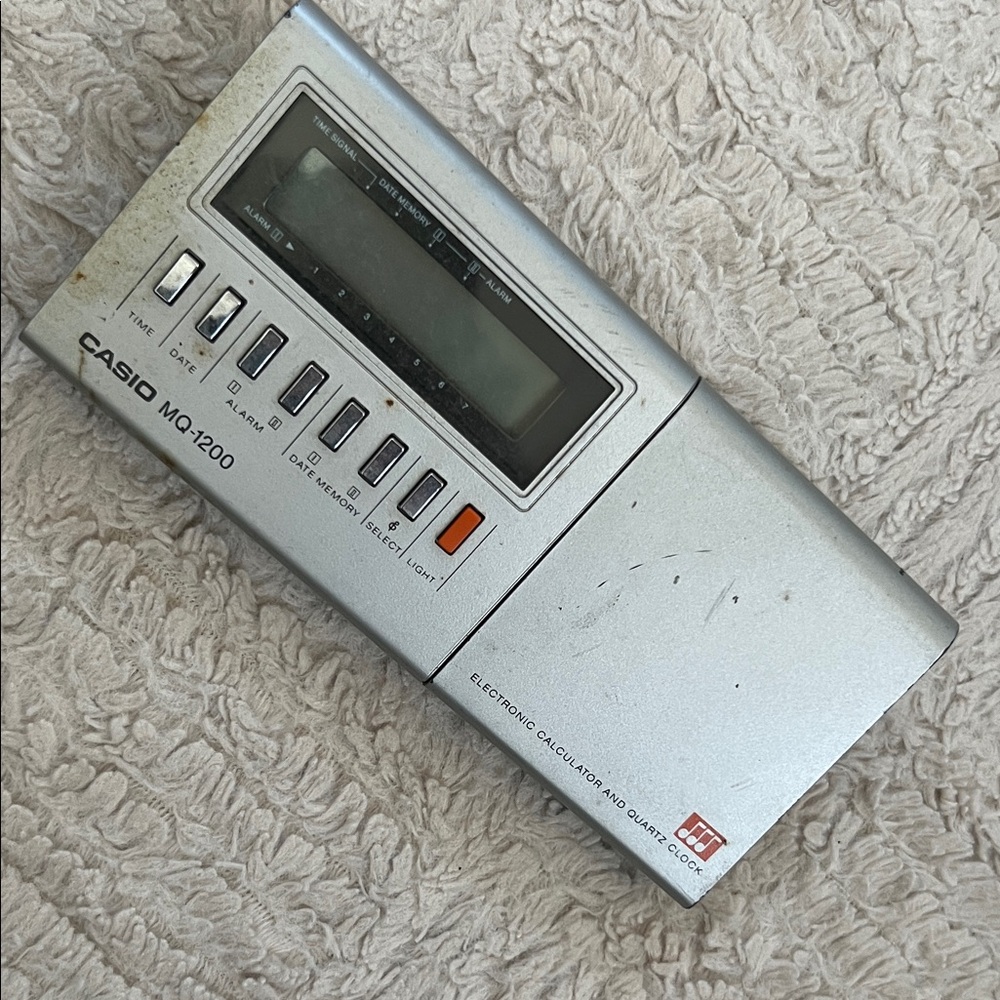 Vintage Casio MQ-1200 Electronic Calculator & Quartz Clock, sold as is